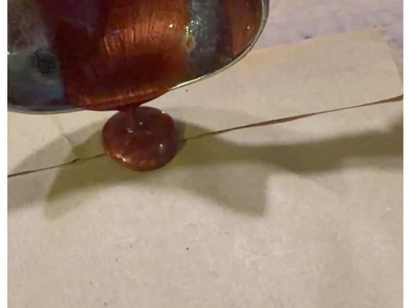 Heating the wax over the candle