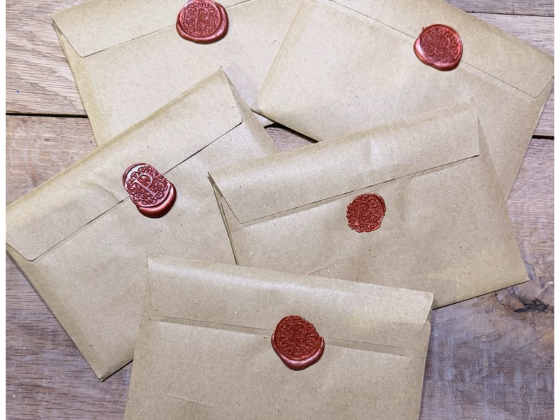 Envelope sealed with wax seal